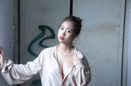 Curvaceous Asian model posing naked and dressed up at the casting