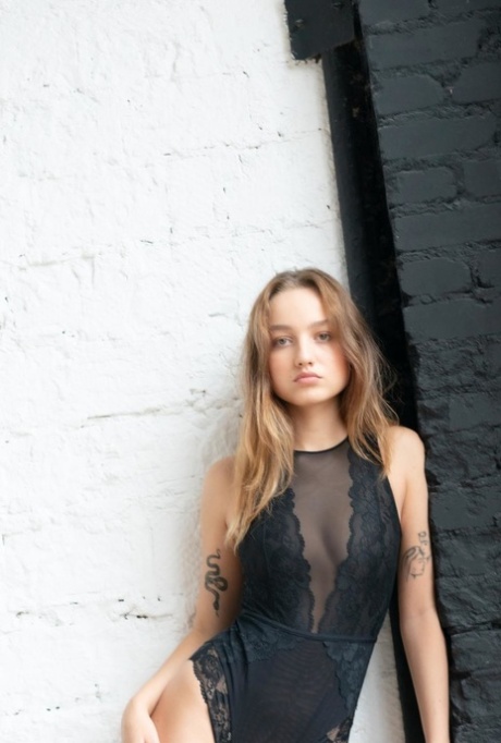 Sweet petite teen Milla poses in hot sheer underwear in a solo show