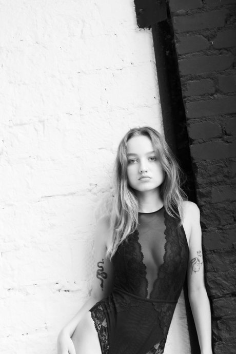 Sweet petite teen Milla poses in hot sheer underwear in a solo show