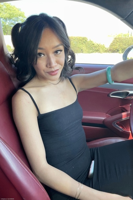 Petite babe Jade Kimiko shows her irresistible shaved pussy up close