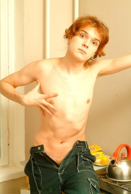 Good-looking twink unveils his small dick in a hot striptease after smoking