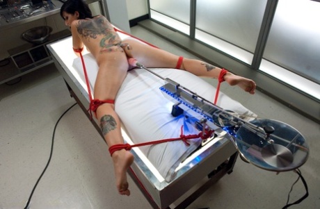 Curvy brunette Tori Lux gets pounded by a machine dildo in a hot BDSM solo