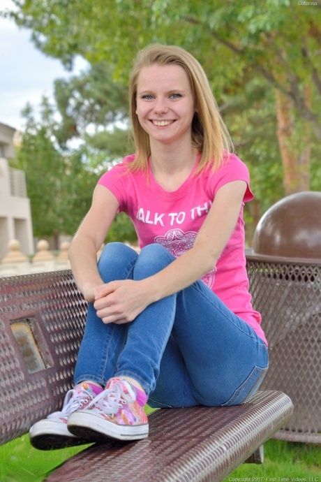 Sweet skinny teen Catarina unveils her tiny tits and tasty clam at the park