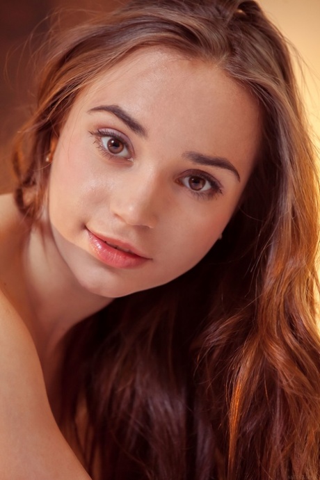Beautiful teen Messiah strips slowly and teases with her yummy butt