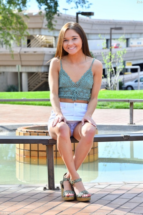 Sensational teen babe Zoe flashing her sexy white panties in public