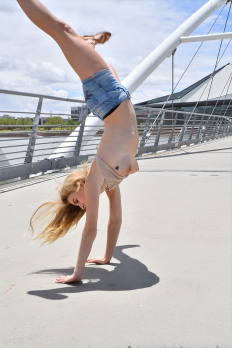 Skinny blonde amateur teen Angelina reveals her tits and butt in public