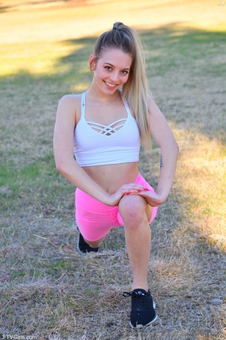Adorable teen Lily reveals her slim body outdoors and toys herself indoors
